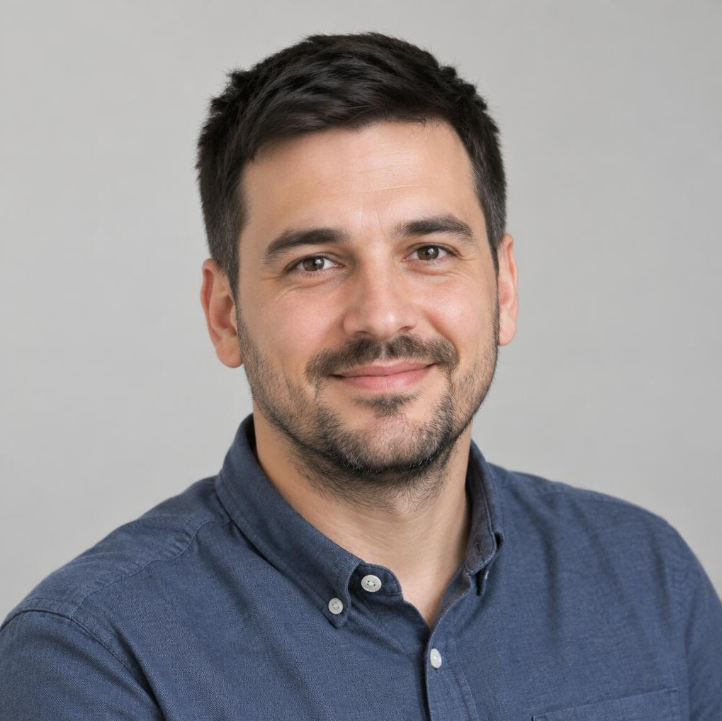 Portrait of a bearded Croatian man in his thirties, section editor