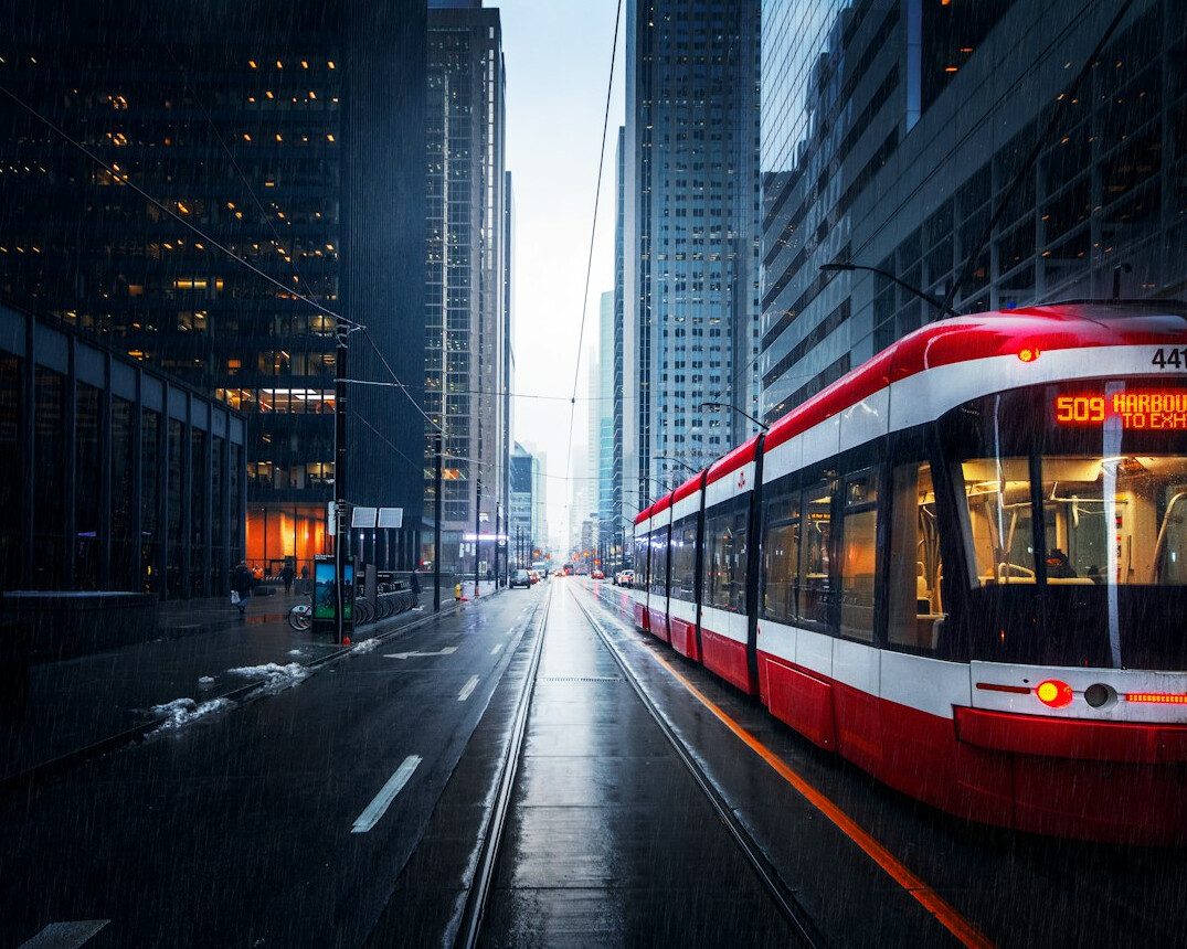 Empty city streetcar stop in downtown Toronto at sunrise